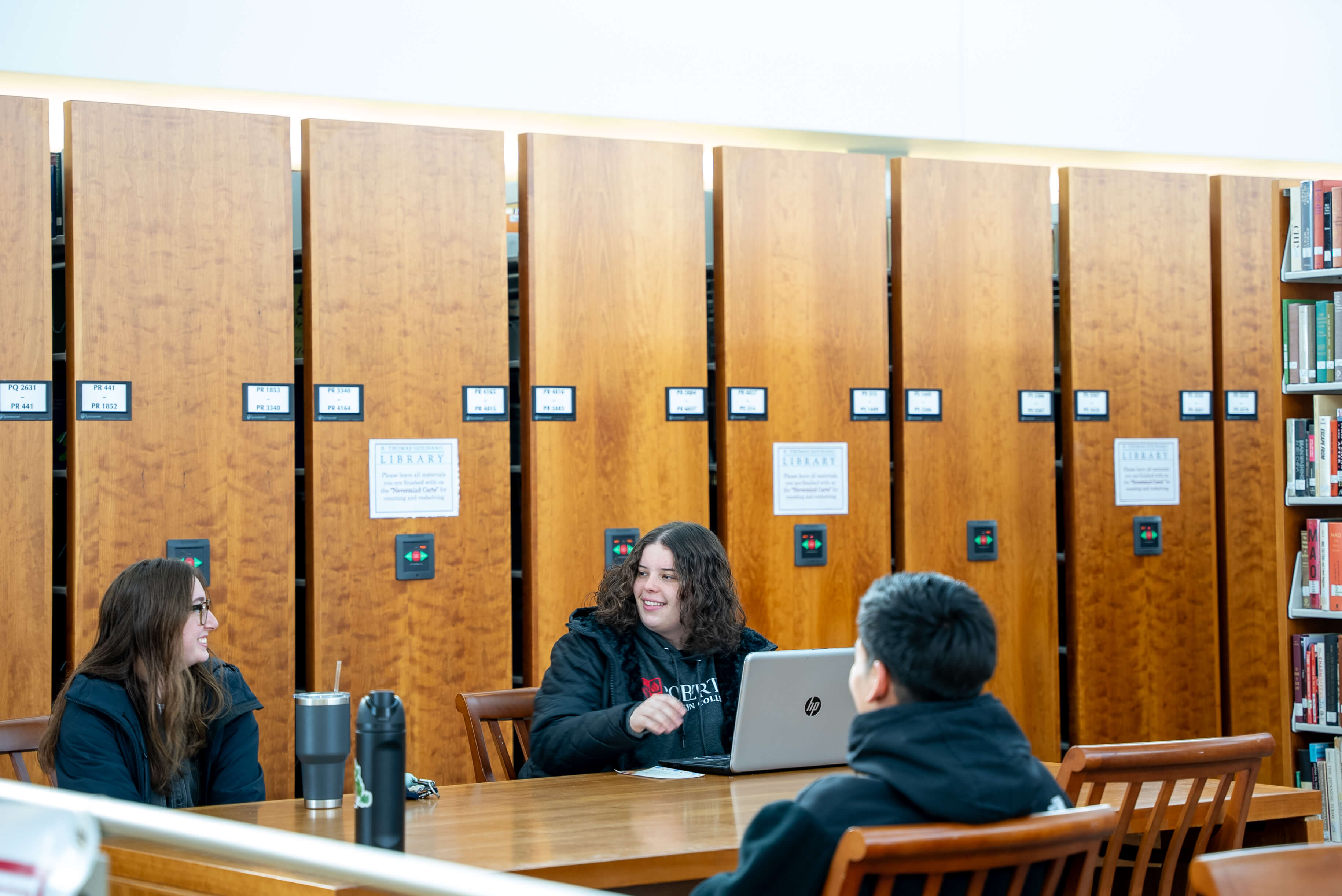 three students working together